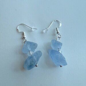 Handmade raw aquamarine nugget earrings in soft icy blue.